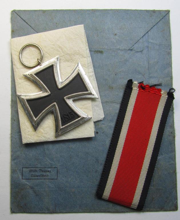 Superb, 'Eisernes Kreuz 2. Kl.' (ie. Iron Cross 2nd Class) being a non-maker-marked example that comes stored in its period, 'Zellstoff'-based pouch as was produced by the: 'Wilhelm Deumer'-company