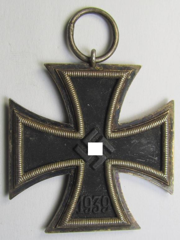 'Eisernes Kreuz 2. Kl.' (ie. Iron Cross 2nd Class) being a maker- (ie. '65'-) marked example that comes stored in its period (albeit sun-faded!), 'Zellstoff'-based pouch as was produced by the: 'Klein & Quenzer'-company