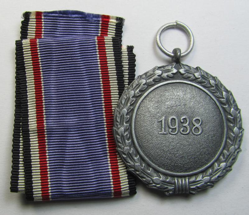 Neat, air-raid-warden service-medal second-class (or: 'Luftschutz-Ehrenzeichen 2. Stufe') being a clearly maker- (ie. '60'-) marked- and/or typical 'regular-weight'-example as was executed in typical, greyish-silver-toned zinc (ie. 'Feinzink')