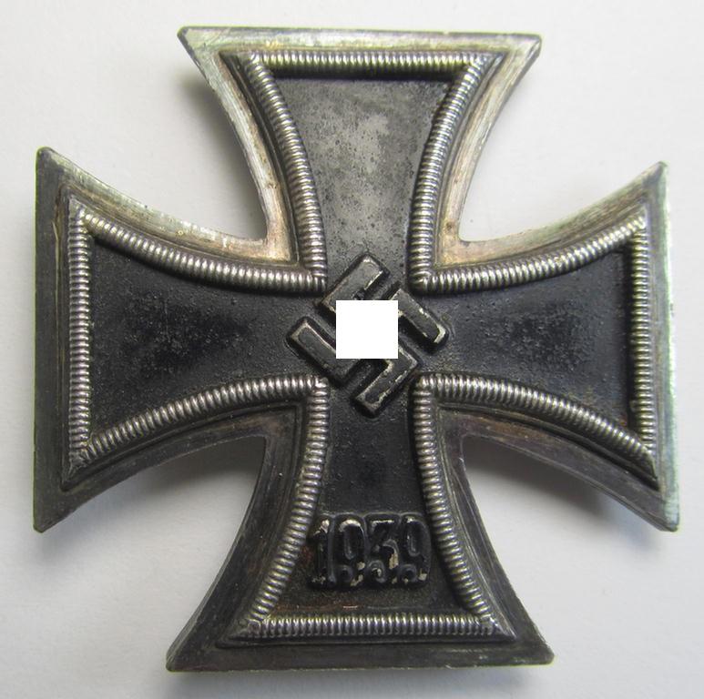 Superb, Iron Cross 1st class (or: 'Eisernes Kreuz 1. Klasse') being a moderately used- (albeit non-maker-marked) example that comes mounted onto its typical 'Schraubscheibe' as was produced by the: 'E.F. Wiedmann'-company