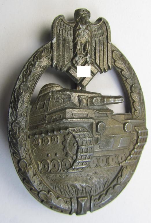 Attractive, 'Panzerkampfabzeichen in Bronze' (or: bronze-class panzer assault badge or PAB) being a neat zinc- (ie. 'Feinzink'-) version (of the so-called: 'solid zinc - Type B'-variant) as was procuced by the: 'Fritz Zimmermann'-company