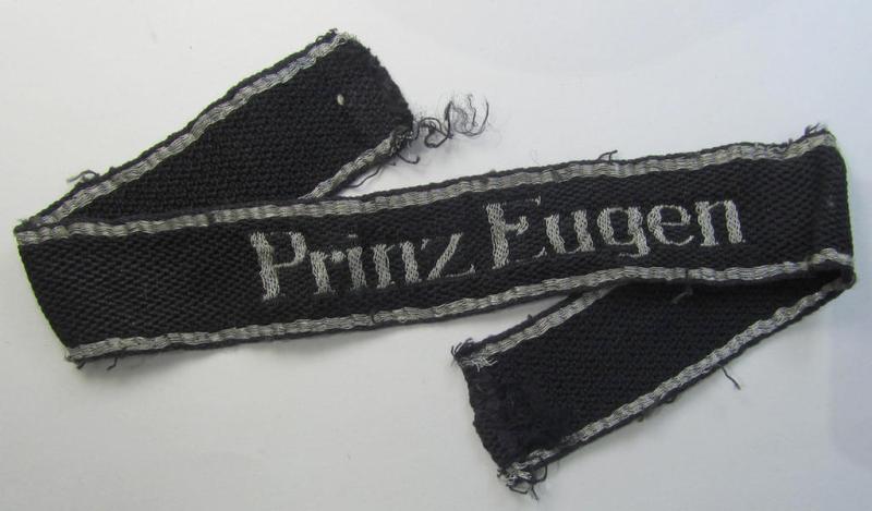 Superb - albeit truly used- ie. tunic-removed! - Waffen-SS officers'-pattern cuff-title, depicting the machine- (ie. flat-wire-) woven 'Latin'-script text as was intended for an officer of the: '7. SS-Freiwilligen Gebirgs-Division 