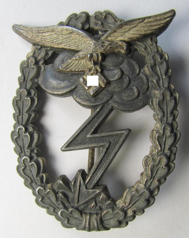 Attractive - and I deem mid- (ie. later-) war-period - zinc- (ie.'Feinzink'-) based version of a WH (Luftwaffe) 'Erdkampfabzeichen' (being a maker-marked example by the 'G.H. Osang'-company having a silvered- and 'riveted' eagle-device attached)