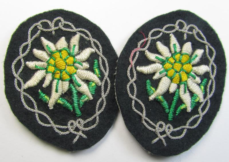 Superb, WH (Heeres) enlisted-mens'- (ie. NCO-) type, so-called: 'Edelweiss'-armpatch, being a hand-embroidered example as was executed on darker-green wool as was intended for usage by the: 'Gebirgsjäger-Truppen' throughout the war