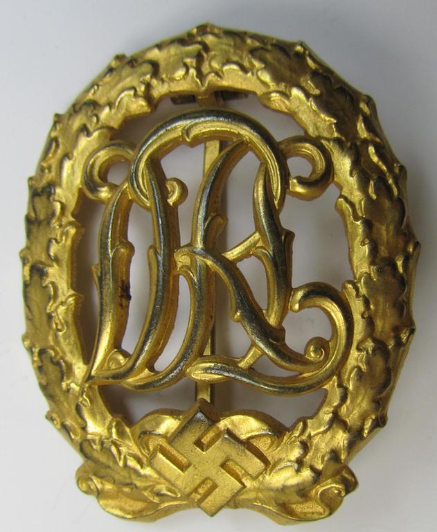 Superb - and actually scarcely found! - 'Reichssportabzeichen DRL in Gold' (or: golden-class DRL sports'-badge) being a truly detailed and/or: neatly maker- (ie. 'Wernstein - Jena'-) marked example that comes in a fully untouched condition