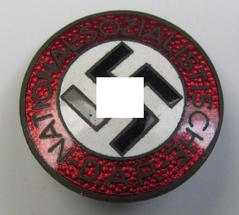 Neatly enamelled- (and bright-red-coloured) 'N.S.D.A.P.'-membership-pin- ie. party-badge (or: 'Parteiabzeichen') which is nicely maker-marked on the back with the makers'-designation: 'RzM' and/or: 'M1/72'