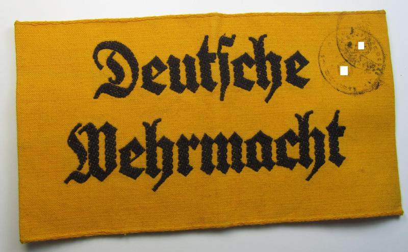 Attractive example of a golden-yellow-coloured armband (ie. 'Armbinde') entitled: 'Deutsche Wehrmacht' being a moderately used example that shows a dual unit-stamp (ie. 'Dienstsiegel')