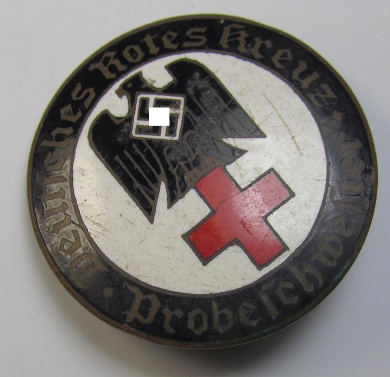 Superb, DRK (ie. 'Deutsches Rotes Kreuz') so-called: nurses'-badge entitled: 'Probeschwester' being a medium-sized version showing an engraved bearers'-number: ('62'), town: ('Karlsruhe') and/or makers'-mark ('A. Stübbe - Berlin')
