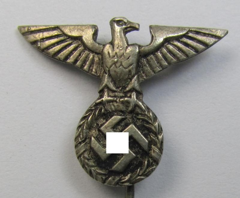 Silverish-coloured - and truly very detailed! - so-called: 'N.S.D.A.P.'-supporter- (ie. membership-) lapel-pin (ie. 'tie'-pin) being a maker- (ie. 'RzM - 9'-) marked example showing a pronounced: 'Reichsadler'-device