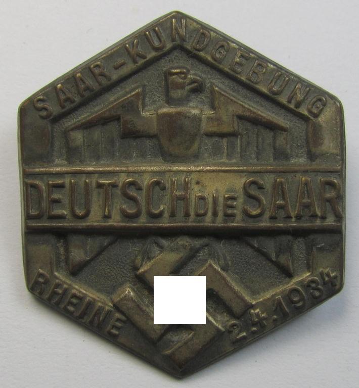 Golden-bronze-toned, (I deem) N.S.D.A.P.-related- (and fairly early-period) day-badge (ie. 'tinnie') as was issued to commemorate a gathering entitled: 'Saar-Kundgebung - “Deutsch die Saar” - Rheine - 2.4.34'