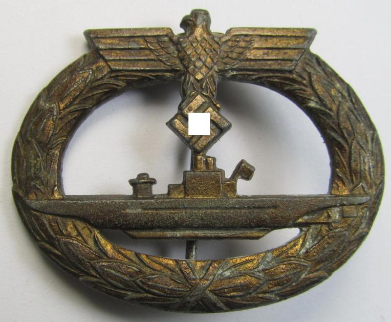 Later-war-period - and typical zinc- (ie. 'Feinzink'-) based - WH (Kriegsmarine), so-called: 'U-Bootkriegsabzeichen' (or: U-boat war-badge) being a clearly maker- (ie. 'ÜÜ'-) marked example as was produced by the: 'E.Ferd. Wiedmann'-company