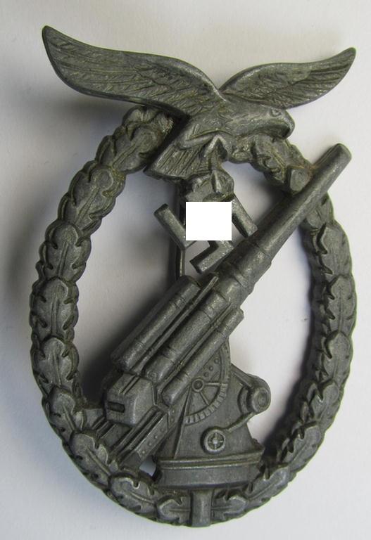 Later-war period- and/or: zinc- (ie. 'Feinzink'-) based- example of a clearly maker- (ie. 'WH'-) marked, WH (Luftwaffe) 'Flakkampfabzeichen' (or: airforce anti-aircraft badge), as was produced by the desirable: 'Wilhelm Hobacher'-company