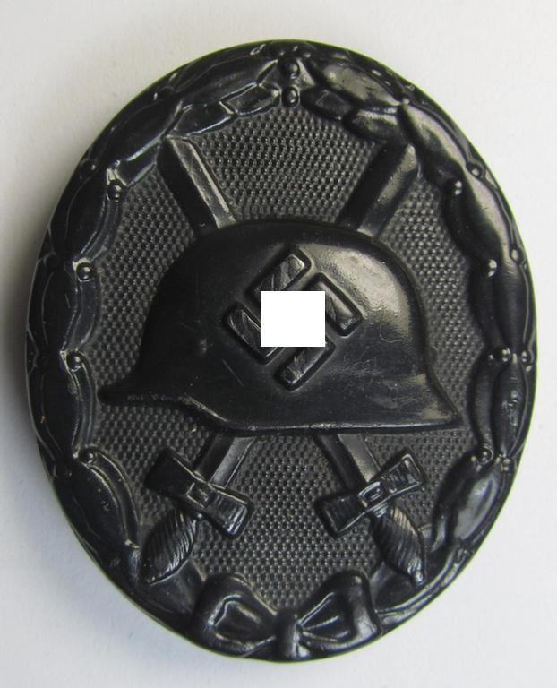 Attractive - and neatly maker- (ie. 'L/21'-) marked! - example of a black-class wound-badge (or: 'Verwundeten-Abzeichen in Schwarz') as was produced by the desirable maker (ie. 'Hersteller'): 'Förster & Barth' based in Pforzheim