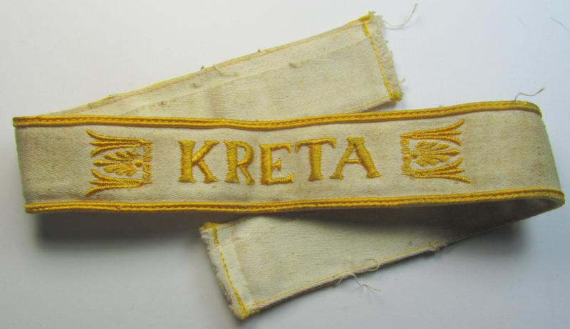 Superb, WH (LW o. Heeres) cuff-title (ie. 'Ärmelstreifen') entitled: 'Kreta' (being a wonderful- and totally non-shortened example that comes in a truly issued- ie. once tunic-attached, condition)