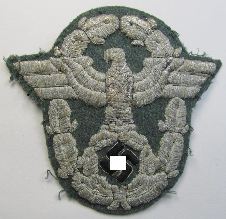 Attractive - and actually fairly scarcely encountered! - neatly hand-embroidered example of an officers'-pattern so-called: 'Polizei' (ie. police) arm-eagle that comes in a clearly used- and/or carefully tunic-removed, condition