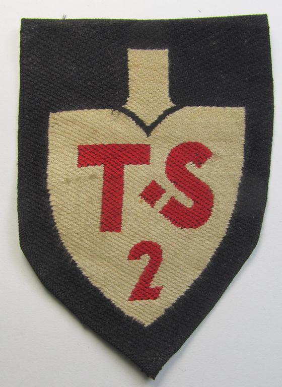 Attractive - and moderately used ie worn! - 'BeVo'-woven, EM- (ie. NCOs'-) pattern, RAD (ie. 'Reichsarbeitsdienst') sleeve-badge (or: 'Dienststellenabzeichen') bearing the specialist- (ie. unit-) designation: 'T.S 2' (ie. 'Truppführerschule 2')