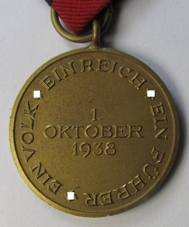 WH Czech-occupation- (ie. 'Anschluss'-) medal: '1. Oktober 1938' being an attractive and just minimally tarnished example that comes stored in its bordeaux-red-coloured- and/or non-maker-marked etui as issued