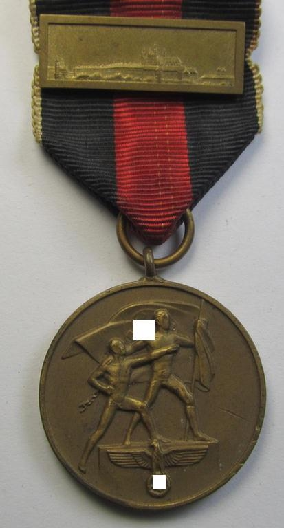 WH Czech-occupation- (ie. 'Anschluss'-) medal: '1. Oktober 1938' being an attractive and example that comes with its period-attached 'PB-Spange' and that comes stored in its bordeaux-red-coloured- and/or non-maker-marked etui