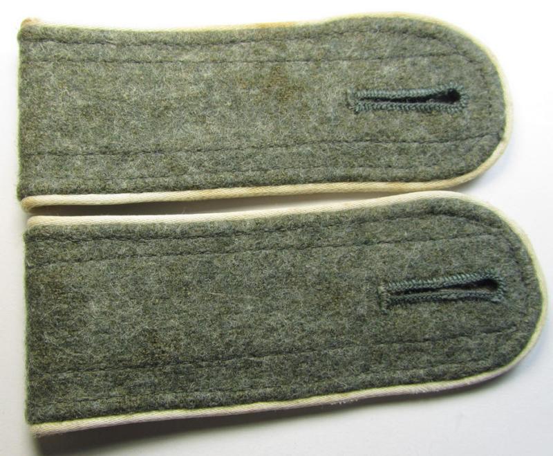 Superb - and fully matching! - pair of later-war-period, so-called: 'M44'-pattern, 'simplified' WH (Heeres) EM-type shoulderstraps as piped in the white-coloured branchcolour as was intended for usage by a: 'Soldat der Infanterie-Truppen'