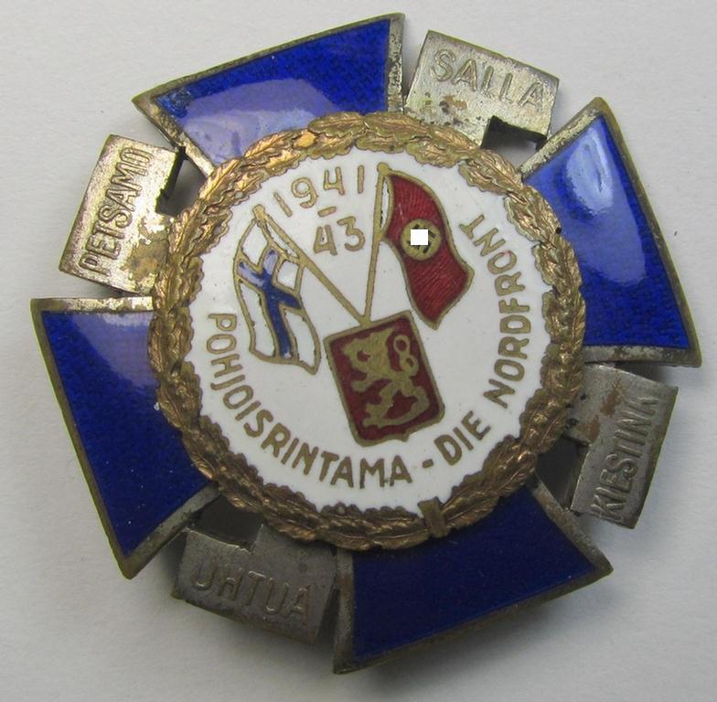 Attractive - and scarcely encountered! - so-called: Finnish-/German: 'Nordfrontkreuz', being a white-/blue-coloured and maker- (ie. 'Hopeatakomo o.y.'-) marked 'variant' that shows the text: 'Pohjoisrintama - Die Nordfront - 1941/43'