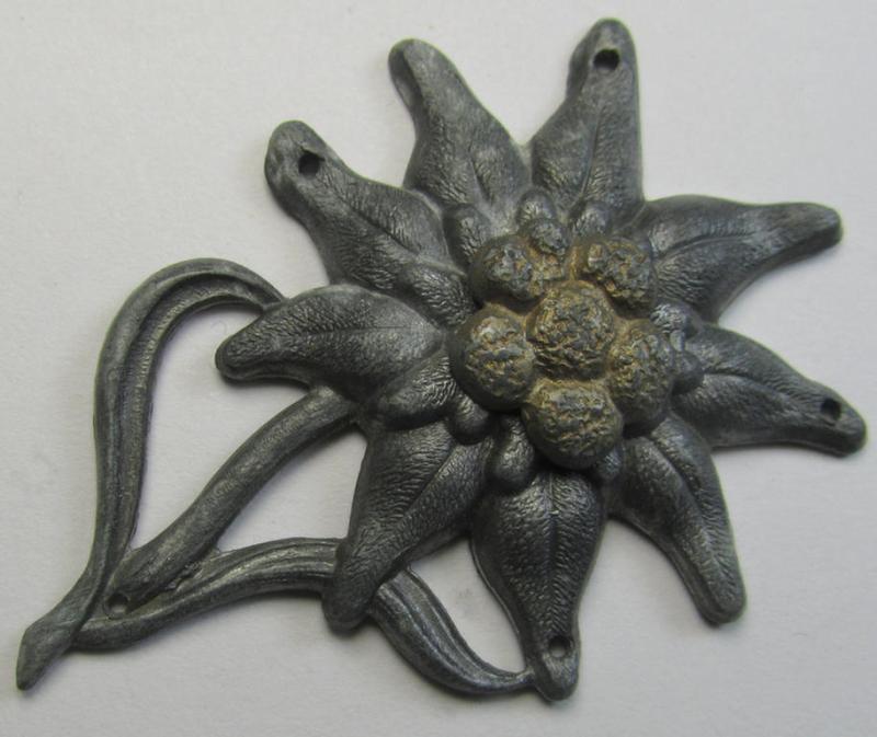WH (Heeres) silver-greyish-coloured and zinc-based (albeit non-maker-marked) so-called: M43-cap-badge (ie. 'Mützenabzeichen') depicting an: 'Edelweiss'-flower as was used by the various 'Gebirgsjäger'- (ie. mountain-troops-) related divisional-staff