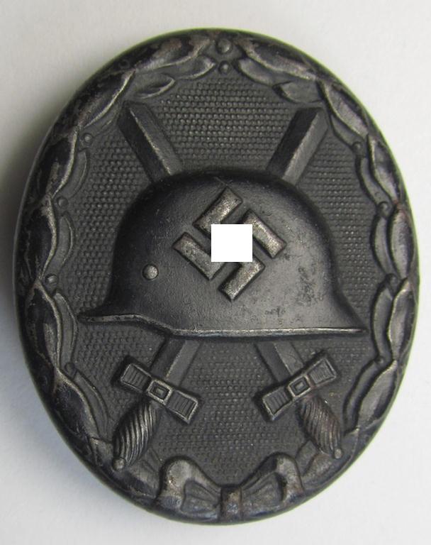 Attractive - and neatly maker- (ie. 'L/56'-) marked! - example of a black-class wound-badge (or: 'Verwundeten-Abzeichen in Schwarz') as was produced by the maker (ie. 'Hersteller'): 'Funcke & Brüninghaus'