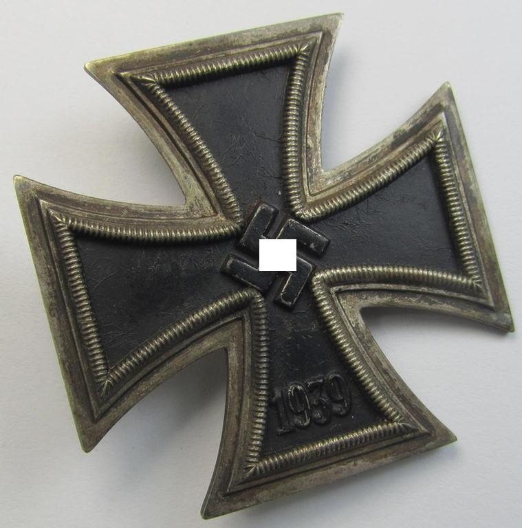 Later-war-period, 'Eisernes Kreuz 1. Klasse' (or: Iron Cross 1st class) being a typical non-maker-marked example as was - I deem - produced by the 'Hersteller' (ie. maker): 'Rudolf Souval'