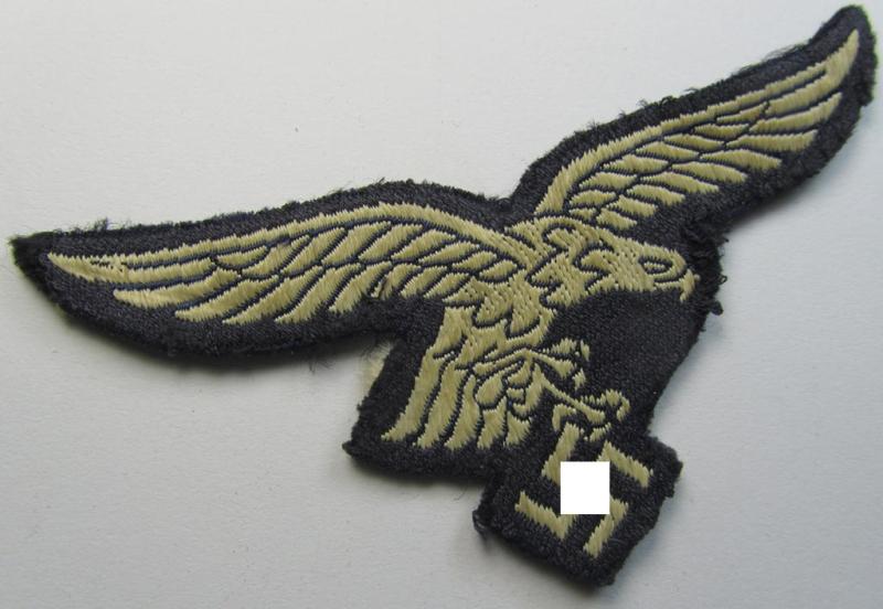 Attractive - and clearly used- ie. carefully tunic-removed! - WH (Luftwaffe) EM- (ie. eventually NCO-) type breasteagle (being a nicely pre-folded- ie. confectioned example as executed in attractive so-called: 'BeVo'-weave-pattern)