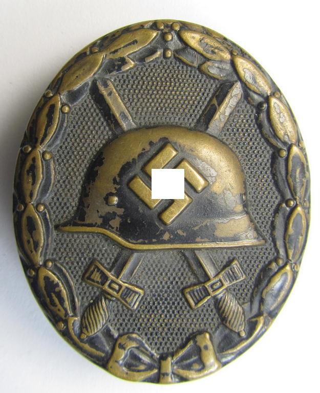 Scarcely seen - and clearly maker- ie. 'L/16'-marked! - example of a black-class wound-badge (or: 'Verwundeten-Abzeichen in Schwarz') being an example as was produced by the: 'Steinhauer & Lück'-company