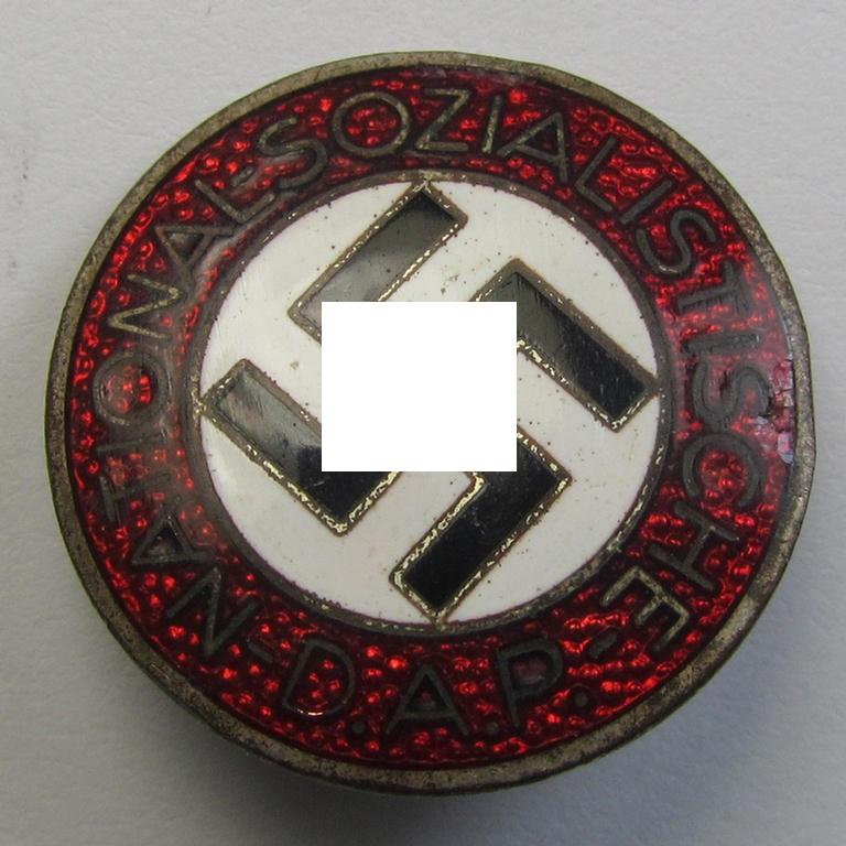 Neatly enamelled- (and bright-red-coloured) 'N.S.D.A.P.'-membership-pin- ie. party-badge (or: 'Parteiabzeichen') which is nicely maker-marked on the back with the makers'-designation: 'RzM' and/or: 'M1/105'
