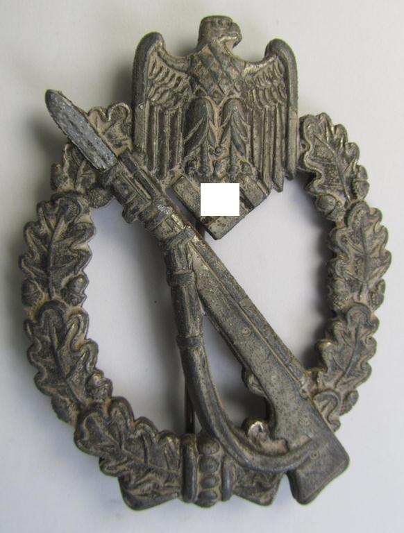 Moderately worn, 'Infanterie Sturmabzeichen in Silber' being a maker- (ie. 'MK' in a triangle-) marked (and/or minimally converse- ie. vaulted-) example by a to date still unidentified maker as was executed in silvered zinc-based metal ('Feinzink')