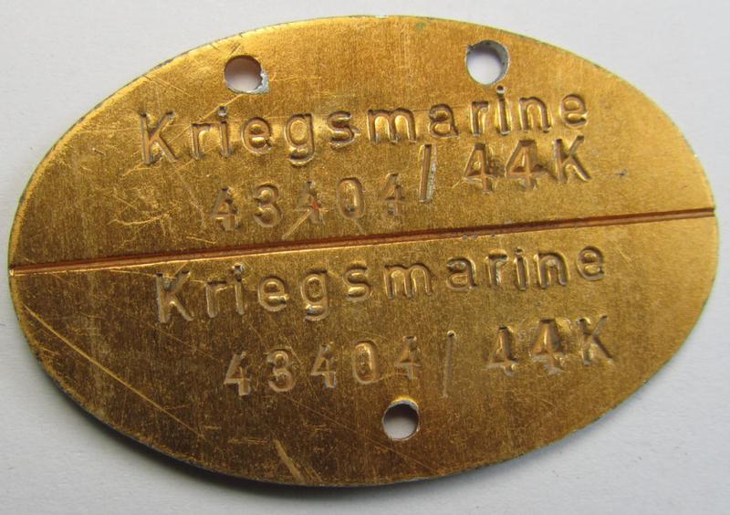 Later-war- (albeit 'standard-issue'-) pattern, WH (Kriegsmarine) typical aluminium-based- and/or bright golden-bronze toned ID-disc (ie. 'Erkennungsmarke') bearing the engraved coded numeral ie. text that reads: 'Kriegsmarine 43404/44K'