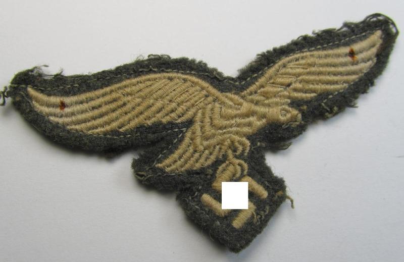 Attractive - and clearly used- ie. carefully tunic-removed! - WH (Luftwaffe) EM- (ie. eventually NCO-) type breasteagle (being a once tunic-attached example as executed in typical machine-embroidered-pattern)