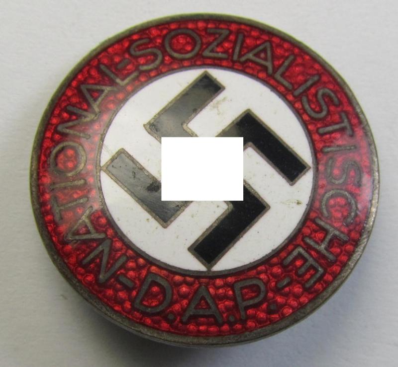 Neatly enamelled- (and bright-red-coloured) 'N.S.D.A.P.'-membership-pin- ie. party-badge (or: 'Parteiabzeichen') which is nicely maker-marked on the back with the (rarely seen!) makers'-designation: 'RzM' and/or: 'M1/13'