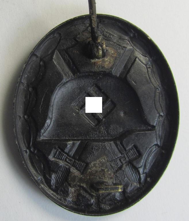 Neat - albeit non-maker-marked - example of a black-class wound-badge (or: 'Verwundeten-Abzeichen in Schwarz') that comes in an overall nice- (ie. just moderately used-), condition