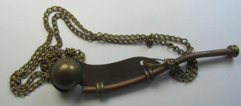 Neat, WH (Kriegsmarine) personal-equipment-item: a golden-bronze-coloured- and (I deem) copper based flute (ie. 'Bootsmanns-Flöte') that comes mounted onto its original also copper-based 'chain'