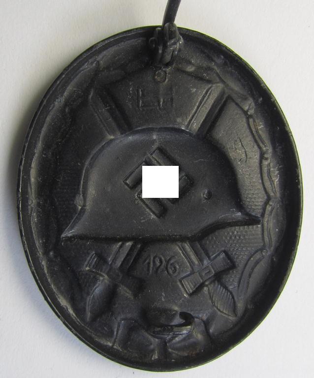 Attractive - dual-maker- (ie. 'E.H.'- and '126'-) marked! -  example of a black-class wound-badge (or: 'Verwundeten-Abzeichen in Schwarz') being an example that was produced by the maker (ie. 'Hersteller') named: 'Eduard Hahn'