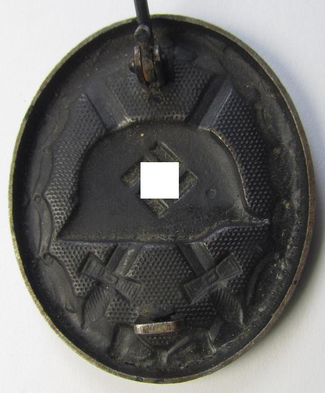 Attractive - and neatly maker- ie. '118'- marked! - example of a black-class wound-badge (or: 'Verwundeten-Abzeichen in Schwarz') being an example that was produced by the Austrian maker (ie. 'Hersteller') named: 'August Menze & Sohn'