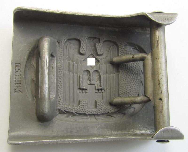 Aluminium-based so-called: DRK (ie. 'Deutsches Rotes Kreuz'), EM- (ie. NCO-) type belt-buckle being a non-maker- (albeit 'Ges.Gesch. 1'-) marked example that comes in a minimally worn- and/or hardly used, condition