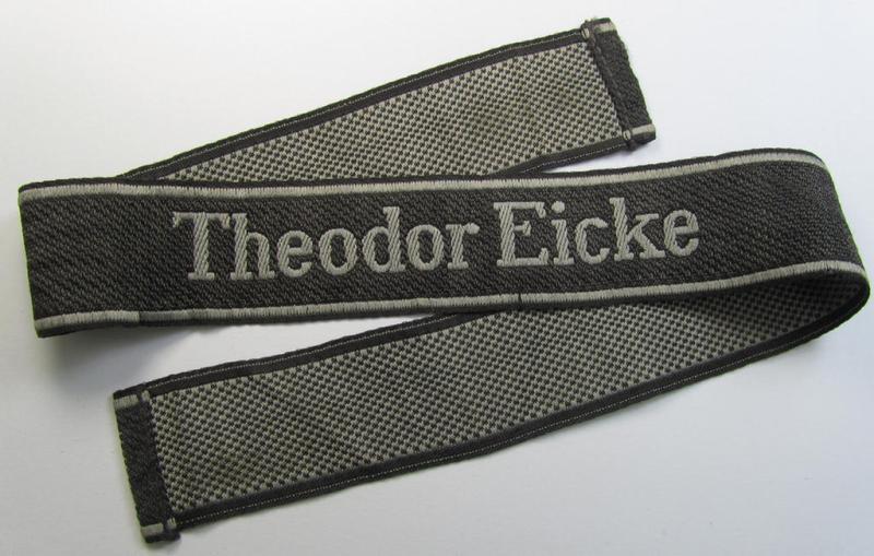 Stunning, Waffen-SS 1943/44-pattern cuff-title (ie. 'Ärmelstreifen') as executed in 'BeVo'-weave-pattern as was intended for a member who served within the: SS-Panzergrenadier-Regiment 'Theodor Eicke'
