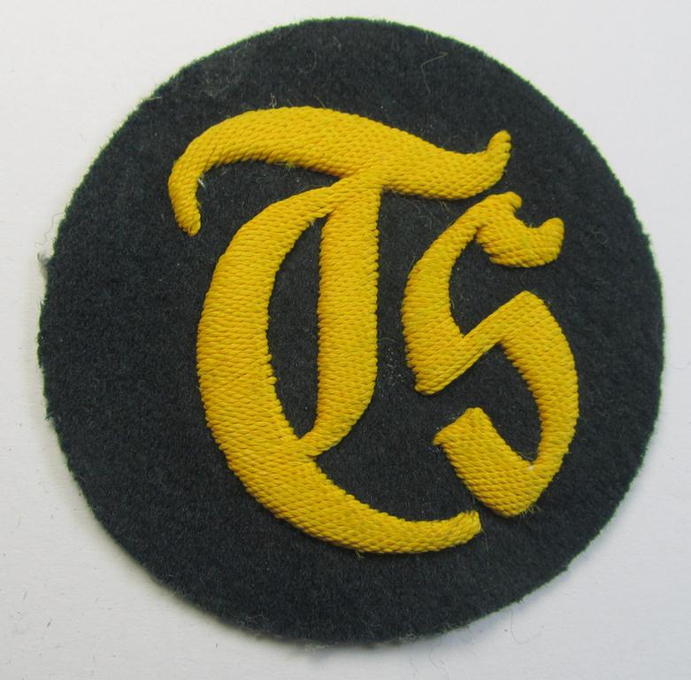 Superb - and truly rarely encountered! - WH (Heeres) hand-embroidered, trade- and/or special-career insignia (ie. 'Tätigkeitsabzeichen') as executed on a darker-green-coloured background as was specifically intended for a: 'Truppensattlermeister'