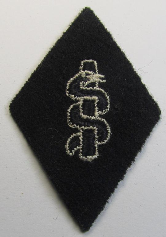 Attractive, Waffen-SS-pattern, machine-embroidered and/or black- and white-coloured sleeve-insignia (ie. 'Ärmelraute') depicting a so-called: 'HJ-Raute' as was used and intended to signify membership within the 'SS-Sanitätsdienst'
