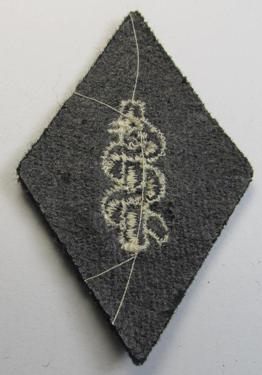 Attractive, Waffen-SS-pattern, machine-embroidered and/or black- and white-coloured sleeve-insignia (ie. 'Ärmelraute') depicting a so-called: 'HJ-Raute' as was used and intended to signify membership within the 'SS-Sanitätsdienst'
