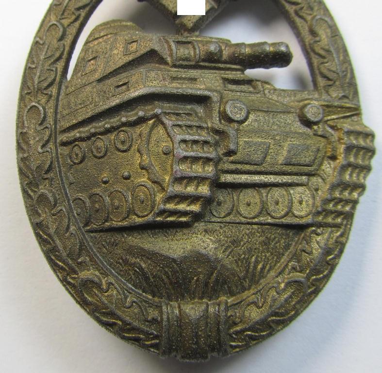 Attractive, 'Panzerkampfabzeichen in Bronze' (or: bronze-class panzer assault-badge or PAB) being a neat zinc- (ie. 'Feinzink'-) version (having a so-called: 'vertical'-set-up) as was procuced by the: 'Steinhauer u. Lück' (ie. 'S.& L.') company