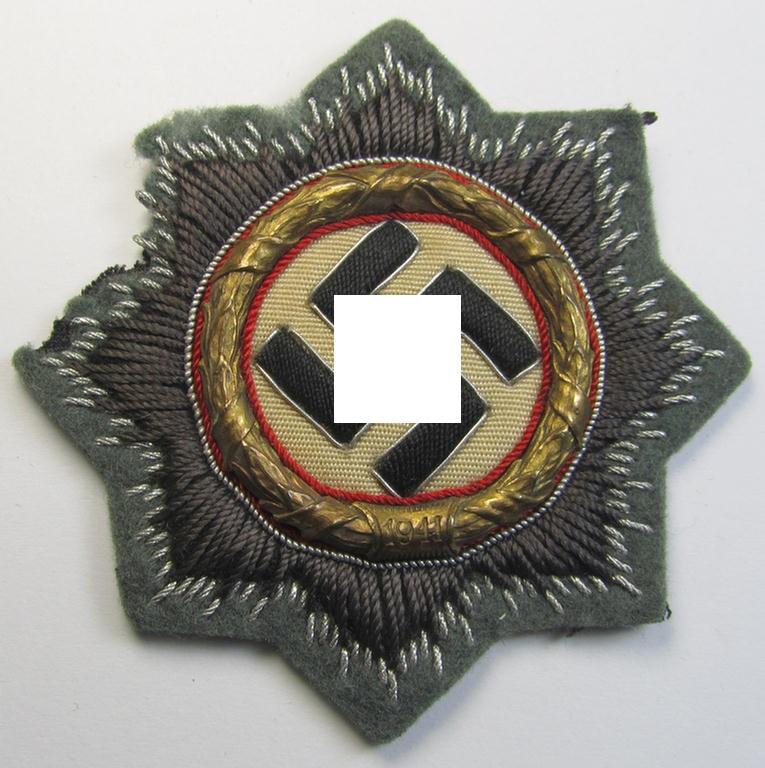 Superb - albeit clearly issued and/or minimally worn! - example of a cloth version of a WH (Heeres o. Waffen-SS) 'Deutsches Kreuz im Gold' (ie. DKiG or German Cross in gold) that comes in an overall very nice, condition