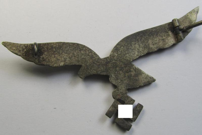 Attractive - and moderately used- ie. worn - WH (Luftwaffe) metal- (ie. 'Buntmetall'-) based breast-eagle as was intended for usage on the white summer-tunics (ie. 'Brustadler für LW Sommerrock') being a detailed- (albeit non-maker-marked-) specimen