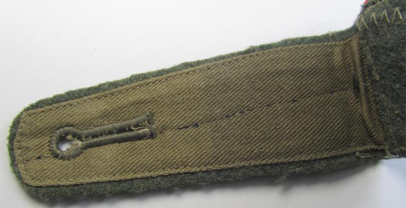 Attractive - albeit regrettably single but truly scarcely encountered! - mid-war period, so-called: 'M40- o. M43'-pattern, WH (Heeres) EM-type shoulderstrap as was intended for usage by a: 'Soldat der Feldgendarmerie-Tpn.'