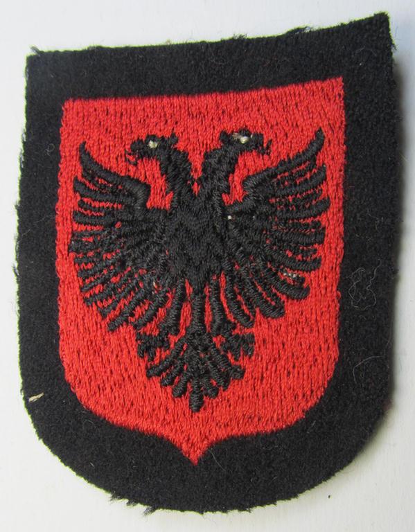 Waffen-SS 'volunteer'-arm-shield as was intended for usage by soldiers of the: '21. Waffen-Grenadier-Division der SS' “Skanderbeg” (ie. 'albanische Nr. 1') and that comes in a 'virtually mint- ie. unissued', condition