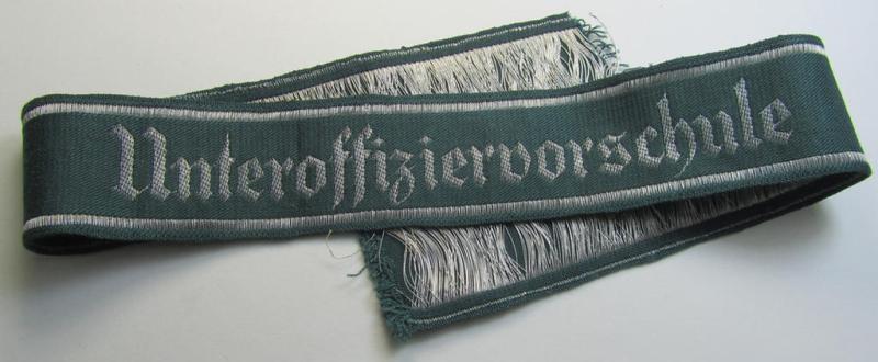 Superb example of an - actually scarcely encountered! - WH (Heeres) linnen-based cuff-title (ie. 'Ärmelstreifen') entitled: 'Unteroffiziervorschule' (as was executed in so-called: 'flat-wire'-style- ie. 'BeVo-weave'-pattern)