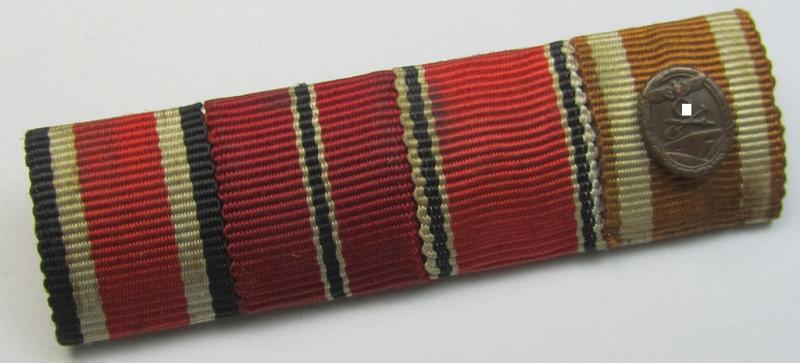 Neat, 4-pieced WH (Heeres etc.) medal-bar (ie. 'Feld- o. Bandspange') showing resp. the ribbons for an: 'EK II. Kl.', an: 'Ost'-medal, an: Austrian 'Anschluss'-medal and a 'Westwall'-medal (with attached golden-bronze 'Miniatur'!)